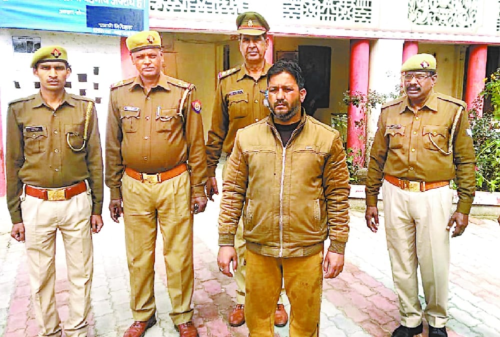 man arrested for posting a pic of pm modi with terrorist hafiz saeed.