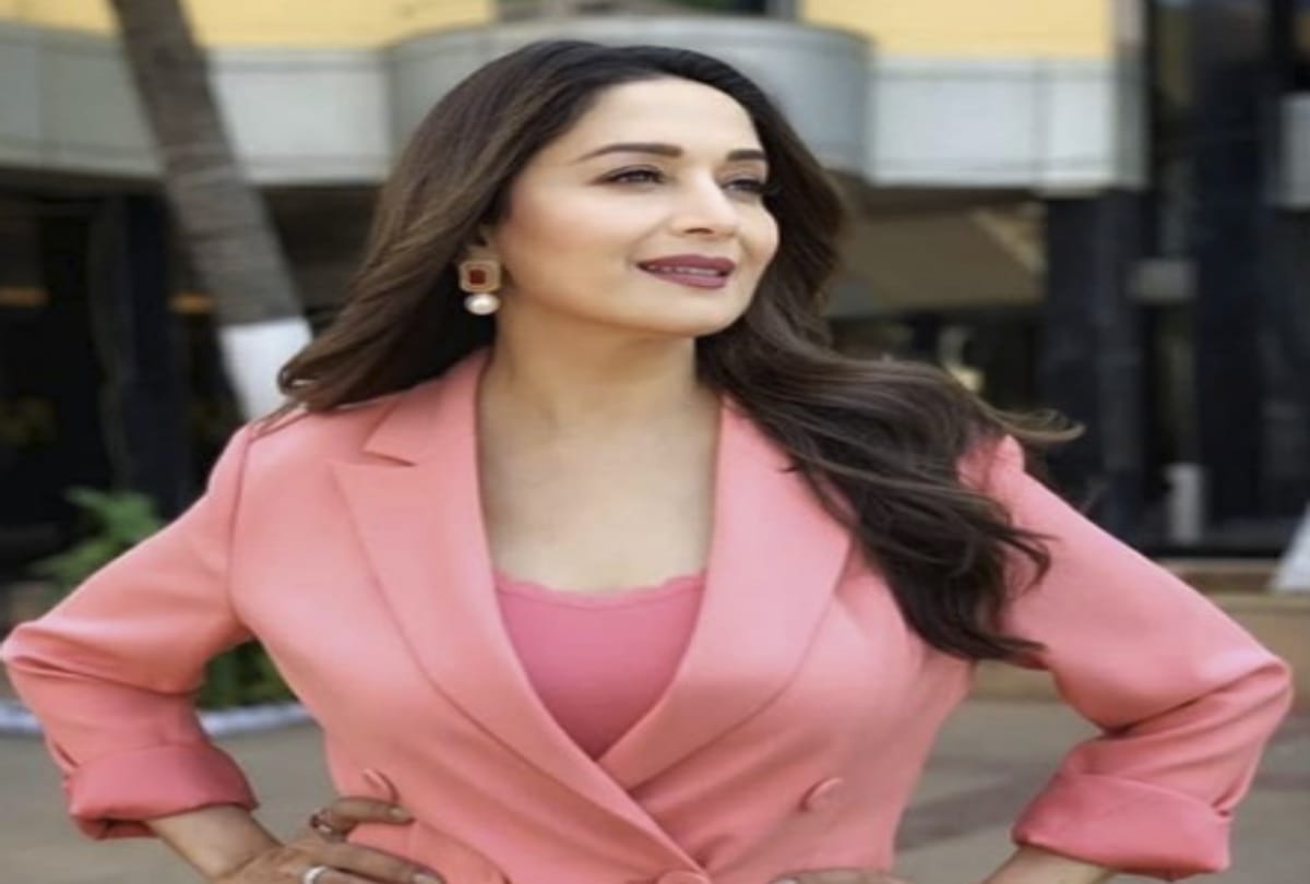 madhuri dixit look hot in this red jump suit