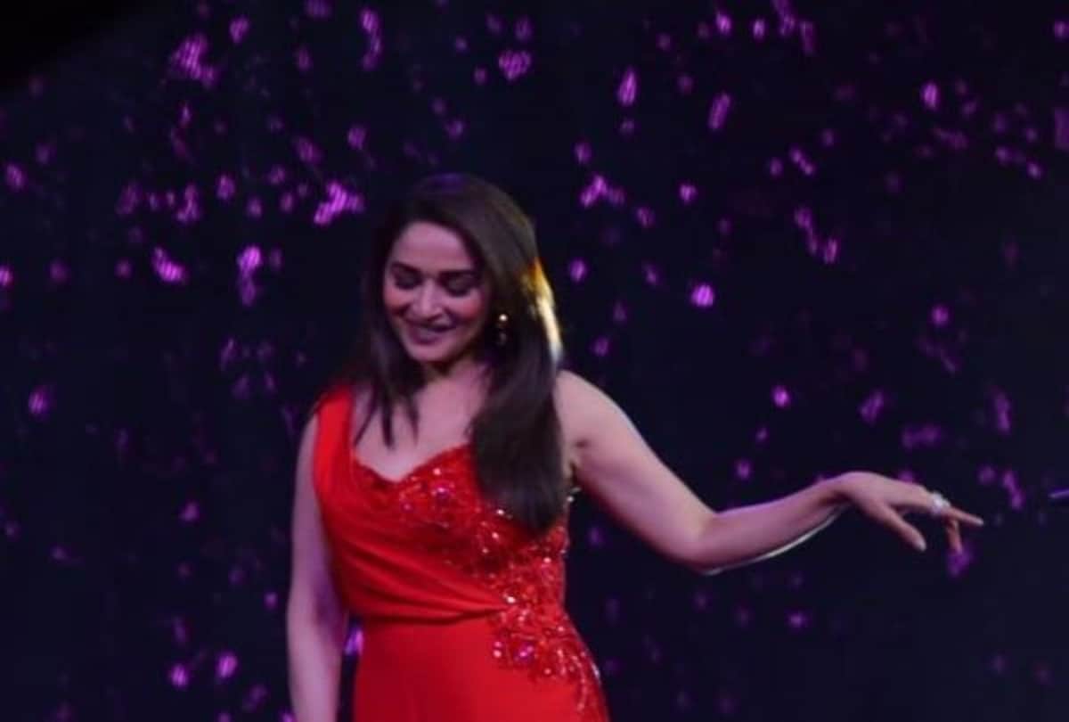 madhuri dixit look hot in this red jump suit