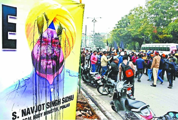 Pulwama Terror Attack, Navjot Sidhu Absent from Cabinet Meeting, Black Ink Pasted on Poster