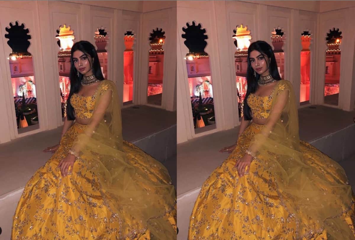 Khushi Kapoor wearing sports shoes with lehenga