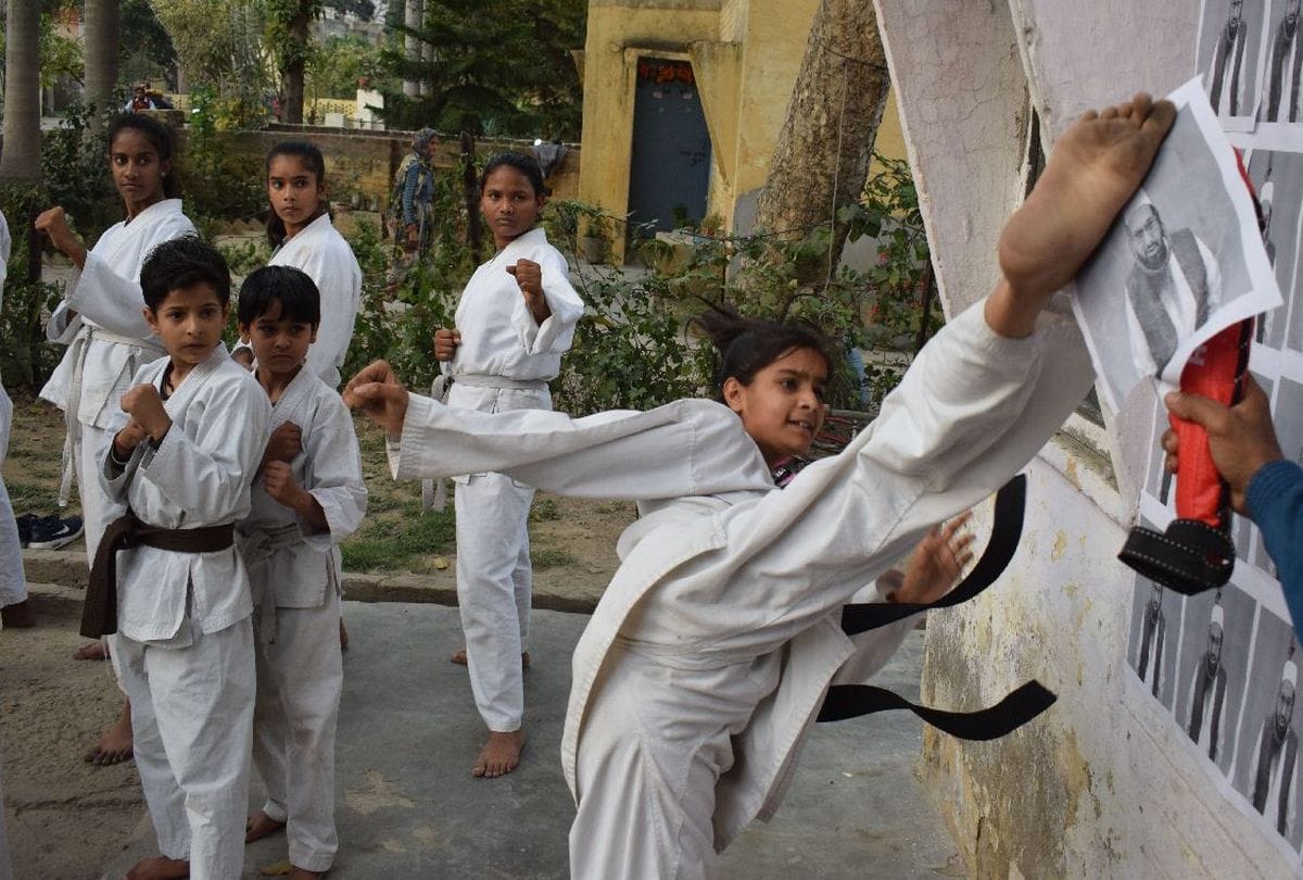martial arts players fight with terrorist hafiz saeed poster in agra