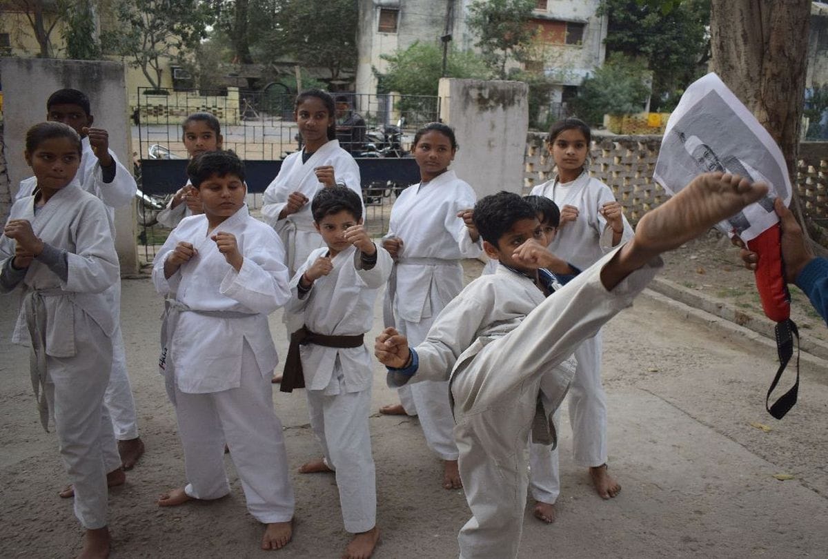 martial arts players fight with terrorist hafiz saeed poster in agra