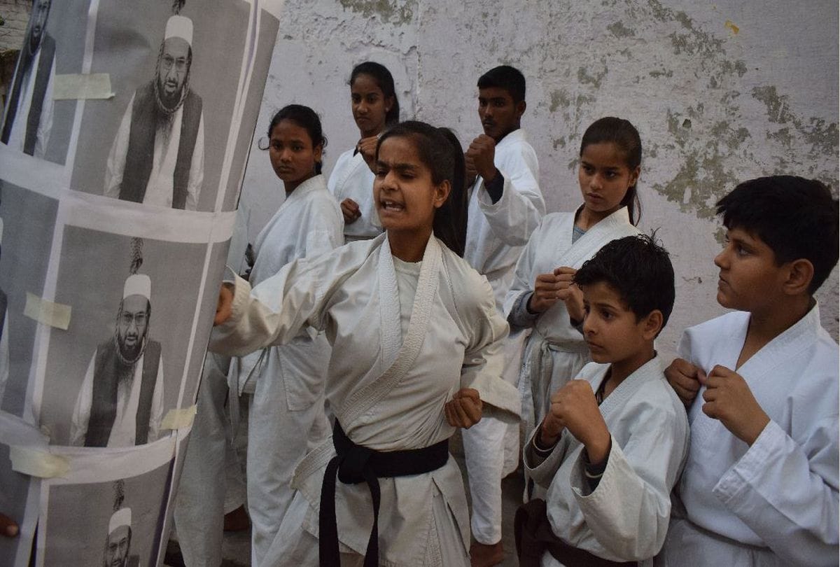 martial arts players fight with terrorist hafiz saeed poster in agra