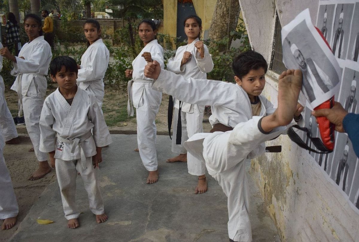 martial arts players fight with terrorist hafiz saeed poster in agra
