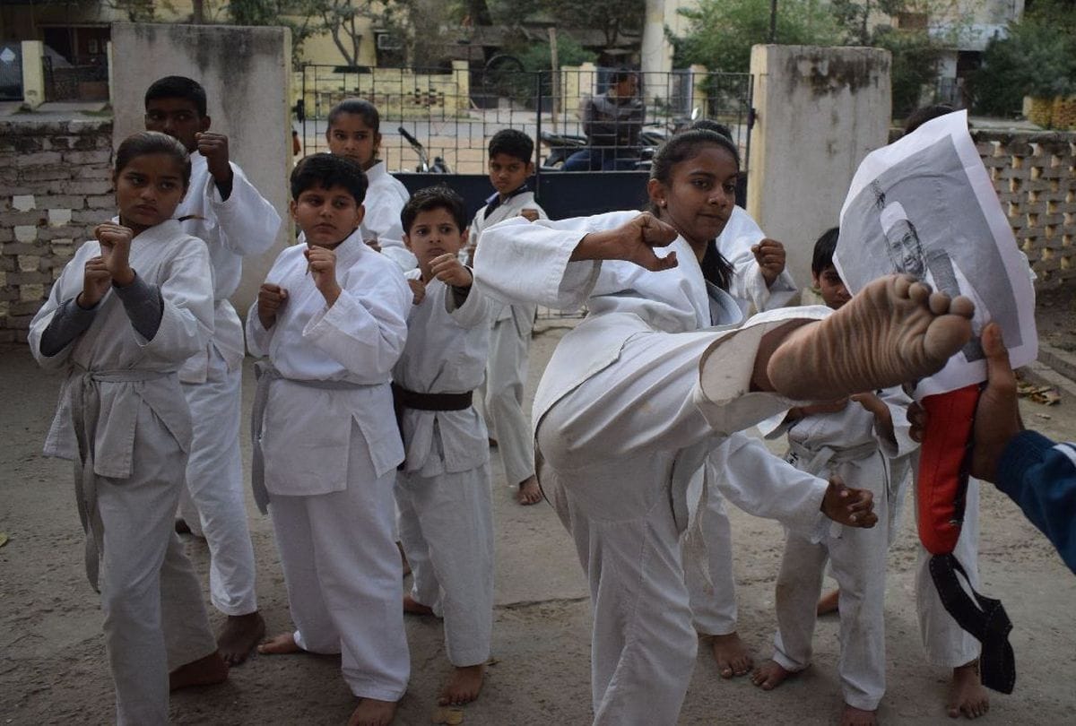 martial arts players fight with terrorist hafiz saeed poster in agra