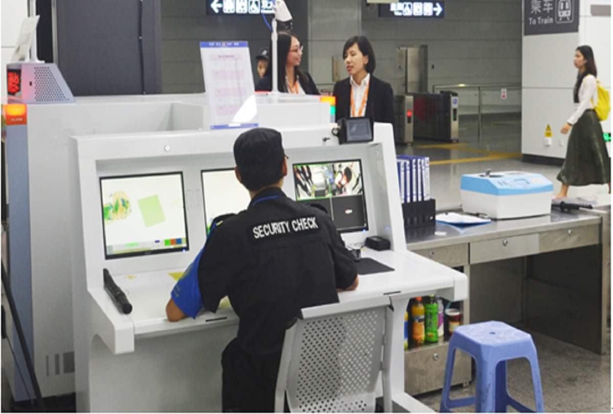 woman climbs into x-ray machine IN railway station with her luggage see viral video  