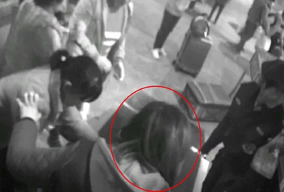 woman climbs into x-ray machine IN railway station with her luggage see viral video  