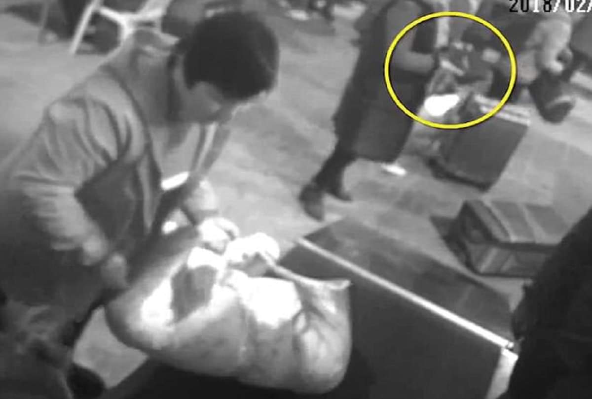 woman climbs into x-ray machine IN railway station with her luggage see viral video  