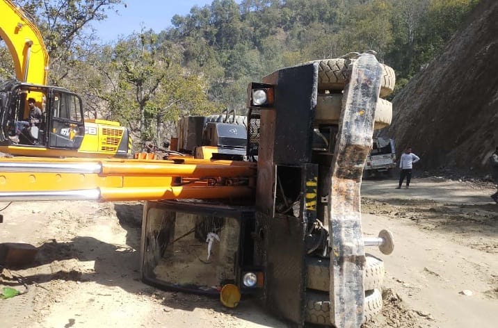 Hydra machine flips during the work of perennial road
