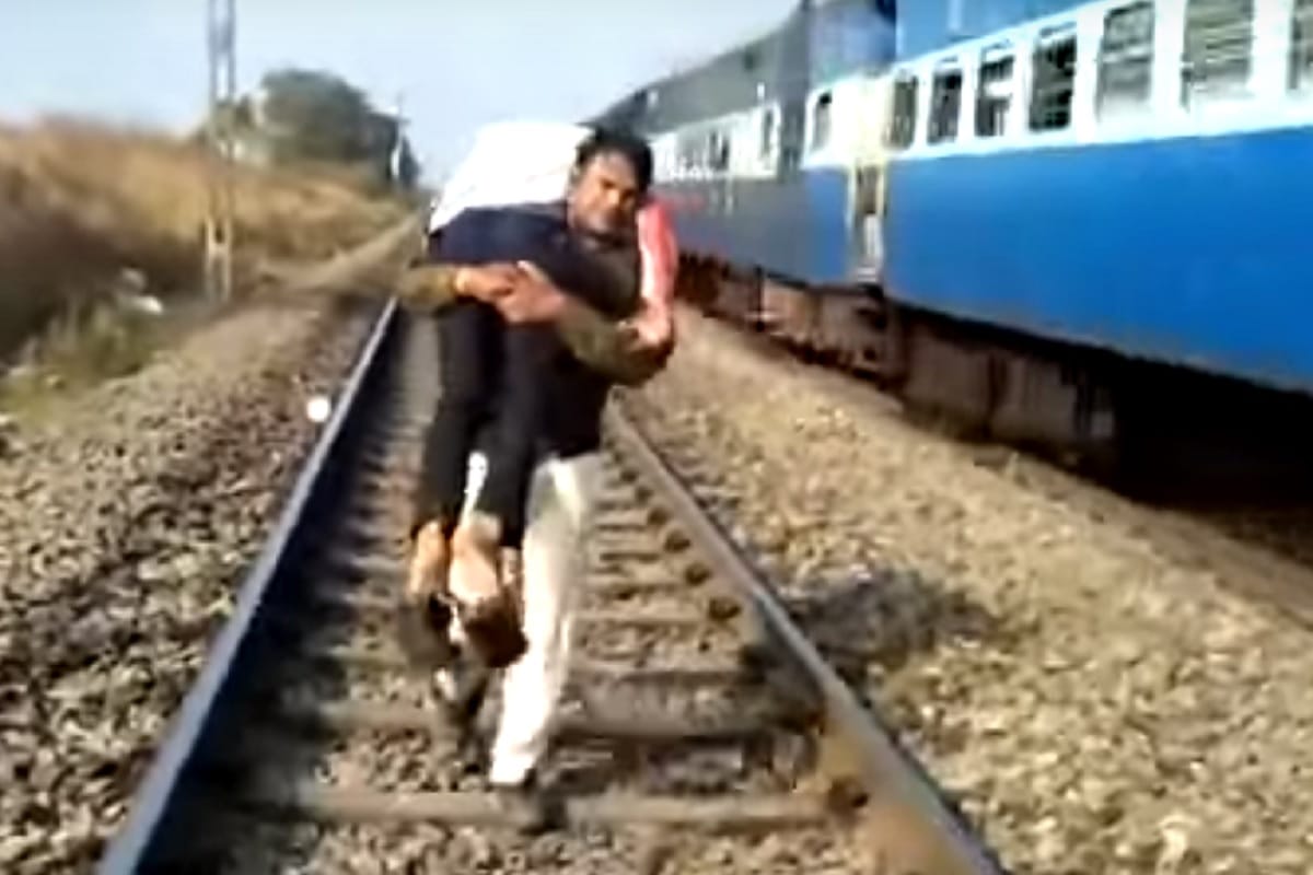 police personnel of MP Police ran for 1.5 km lifting man on his shoulder who fell from train
