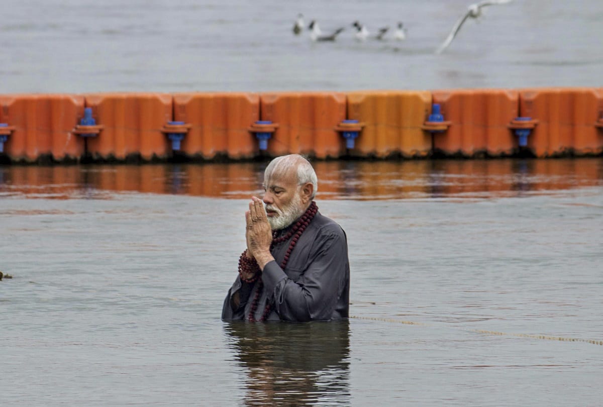 Narendra Modi Amit Shah Smriti Irani Yogi take holy dip during Kumbh Mela 2019