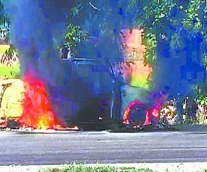 A sudden burnt car on the highway