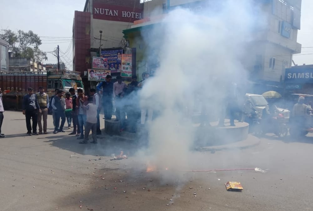 people celebrate the air strike by indian air force in pakistan.