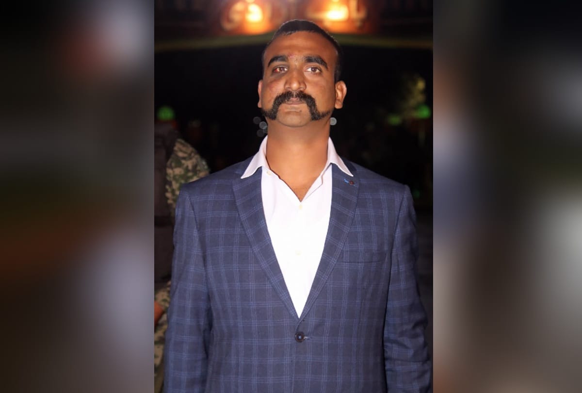 photos Abhinandan returns, parents meet in hospital he say will return to duty 7 hours delay reason