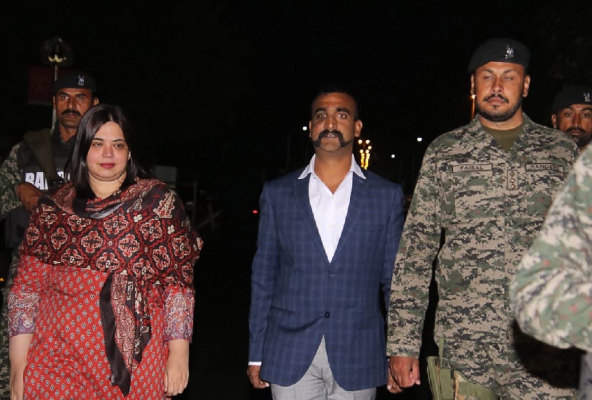 photos Abhinandan returns, parents meet in hospital he say will return to duty 7 hours delay reason