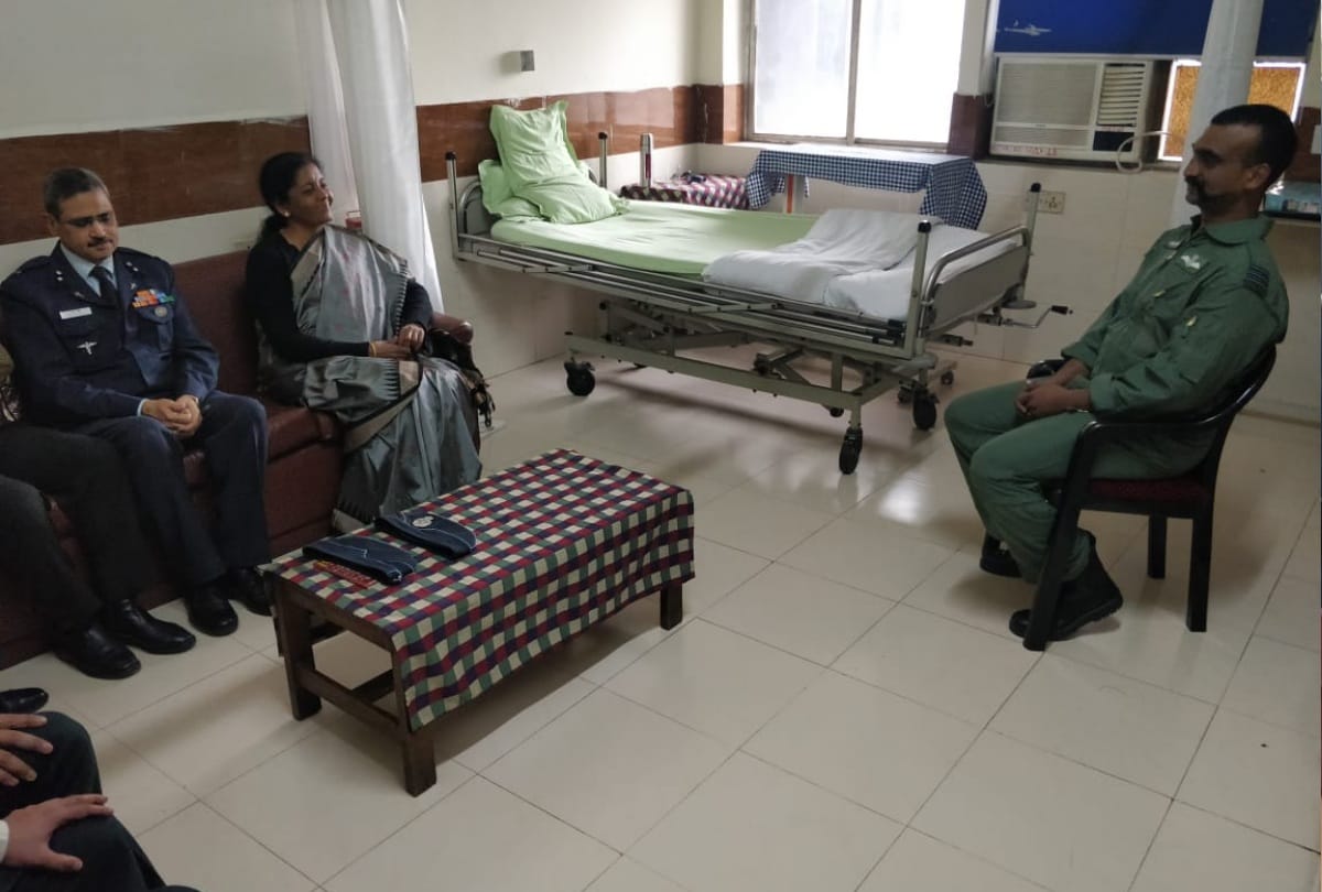 photos Abhinandan returns, parents meet in hospital he say will return to duty 7 hours delay reason