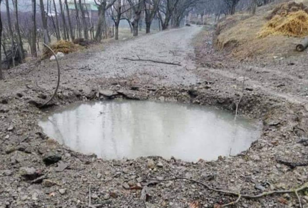 IED blast damages road in Tral Pulwama at jammu