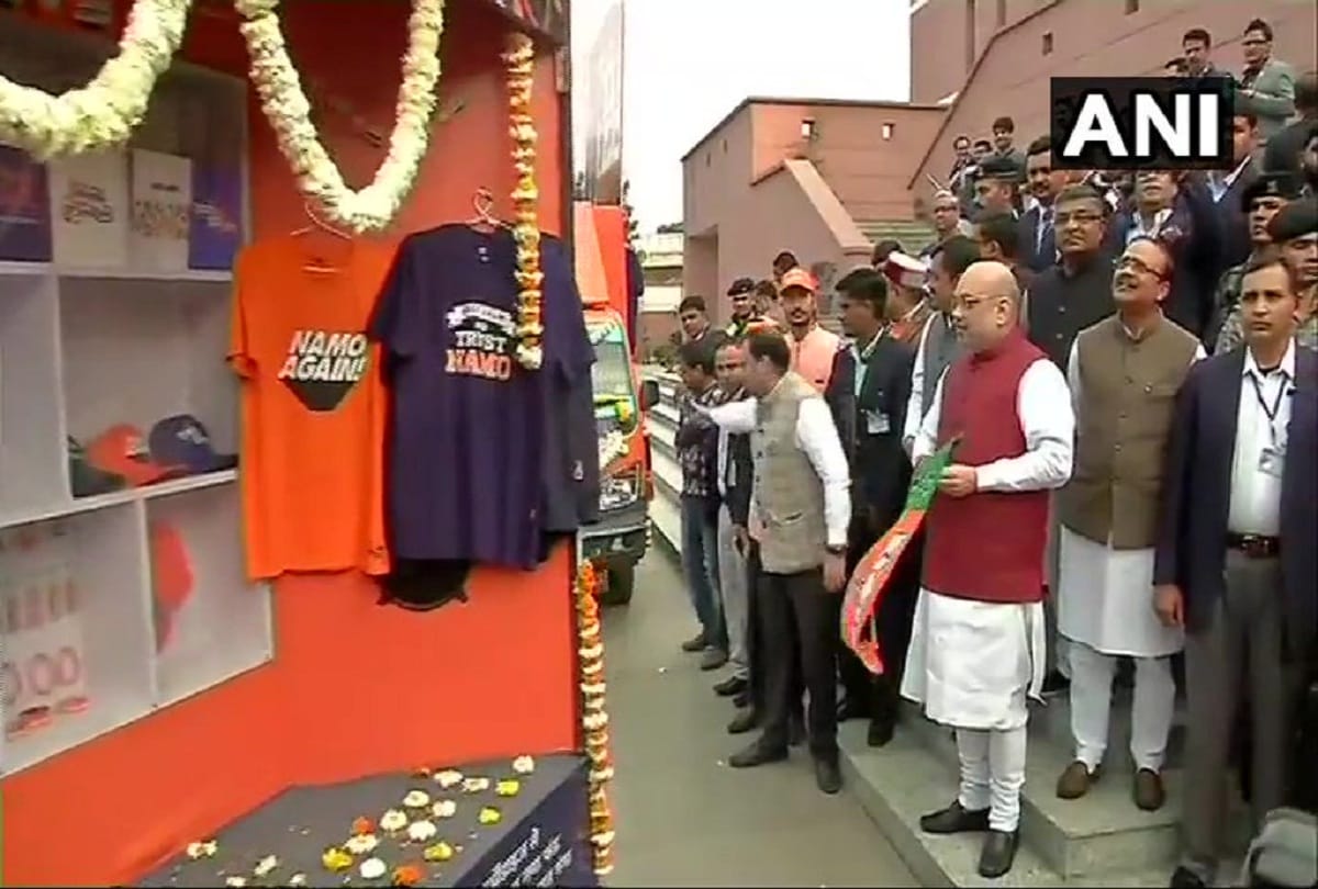 Amit Shah flags off NaMo Merchandise vans from BJP Headquarters at Deendayal Upadhyaya Marg