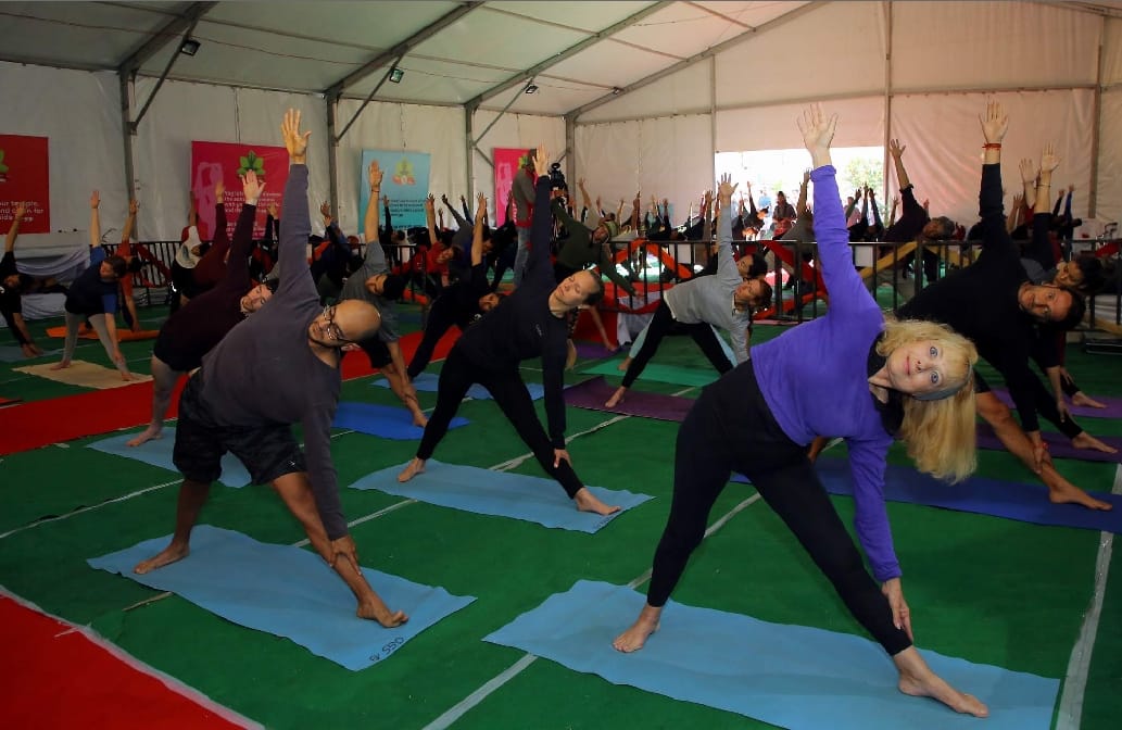 Foreigners Doing Yoga for make world record in international yoga festival 2019