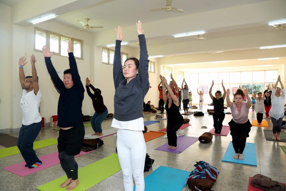 Foreigners Doing Yoga for make world record in international yoga festival 2019