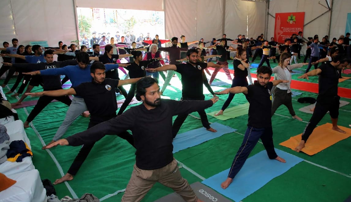 Foreigners Doing Yoga for make world record in international yoga festival 2019