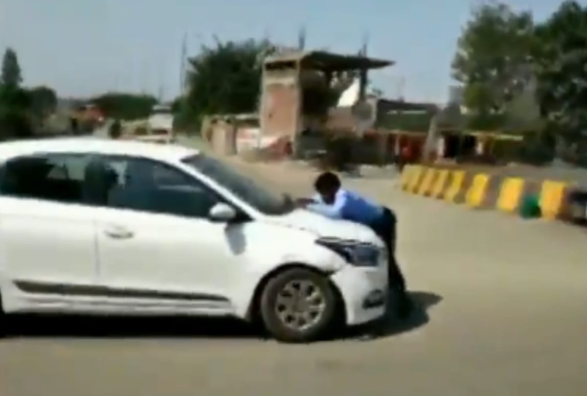 ghaziabad in a road rage cab driver drove for almost 2 km with a man clinging on car bonnet