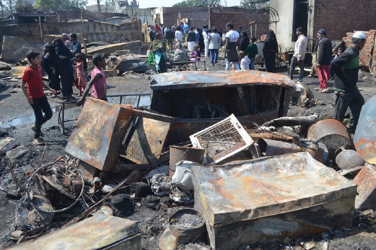 Meerut Bawal: Police rescued ten Hindu families from the fire in bhusa mandi