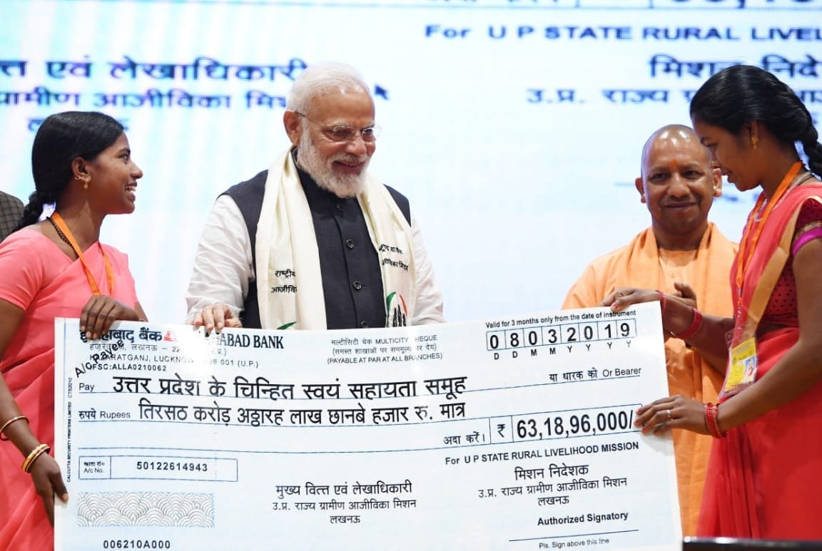 Narendra modi honor women at women day in varanasi