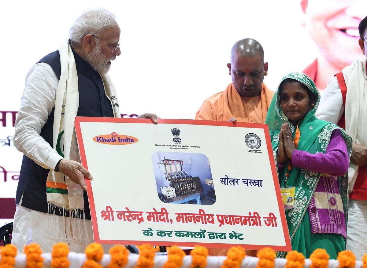 Narendra modi honor women at women day in varanasi