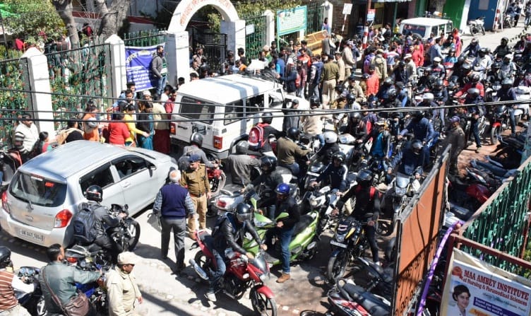 Alps workers put signboard on goods road
