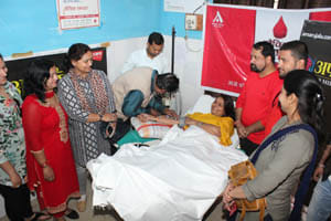 woman blood donation camp