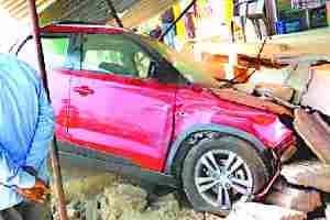 Bike collided with car and rammed into the store