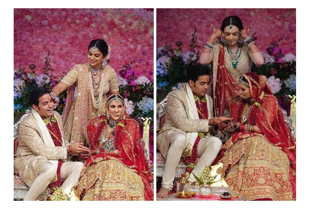 akash ambani shloka mehta wedding nita ambani weaves Akash Shloka name on her outfit