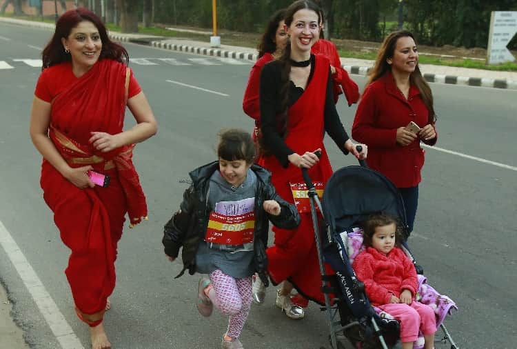 Womens Run on Road in Red Saree in Chandigarh