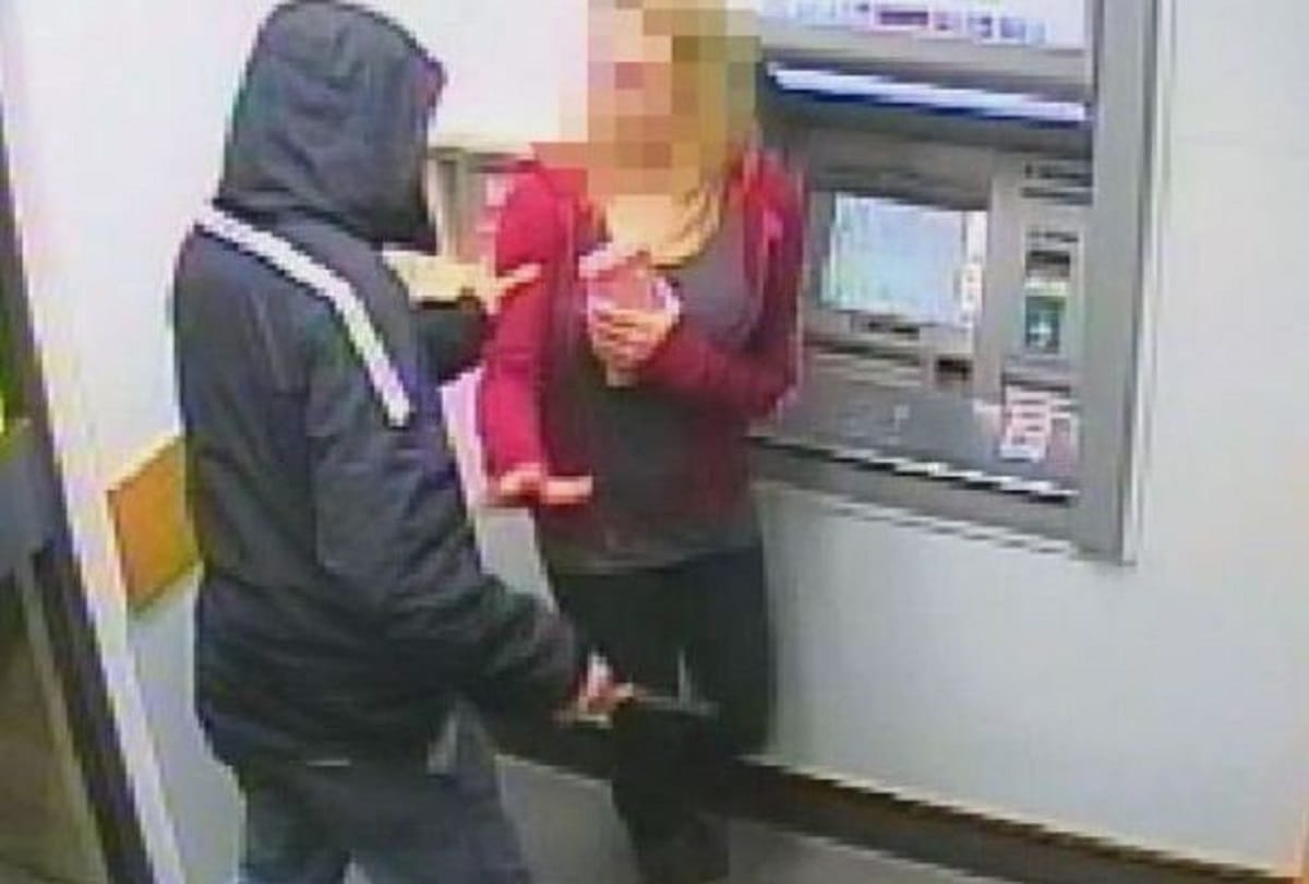 Man in China robs woman at ATM robber returns money after checking bank balance