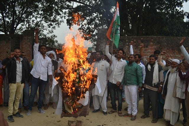 blow the effigy of Congress candidate