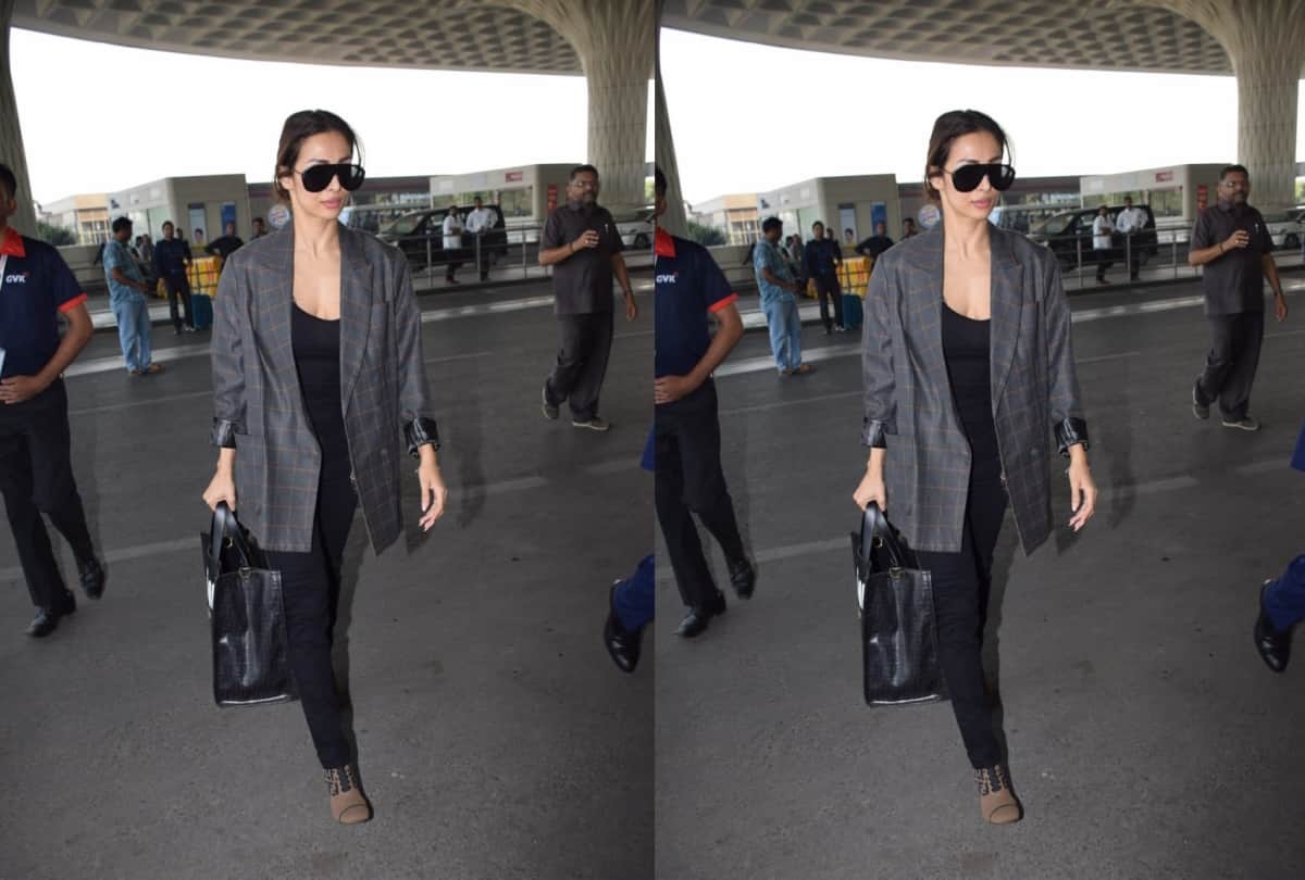 Malaika Arora pairs her airport look with Fendi bag and boots
