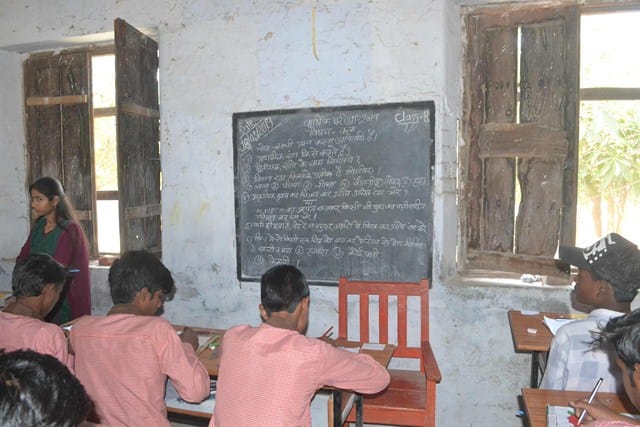 Examination of Council schools started by writing a question on black board