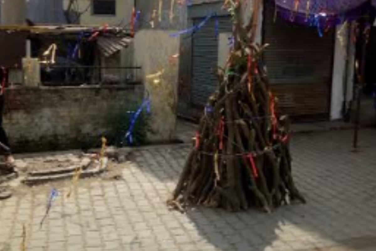 Woman stopped from burning Holi due to land dispute