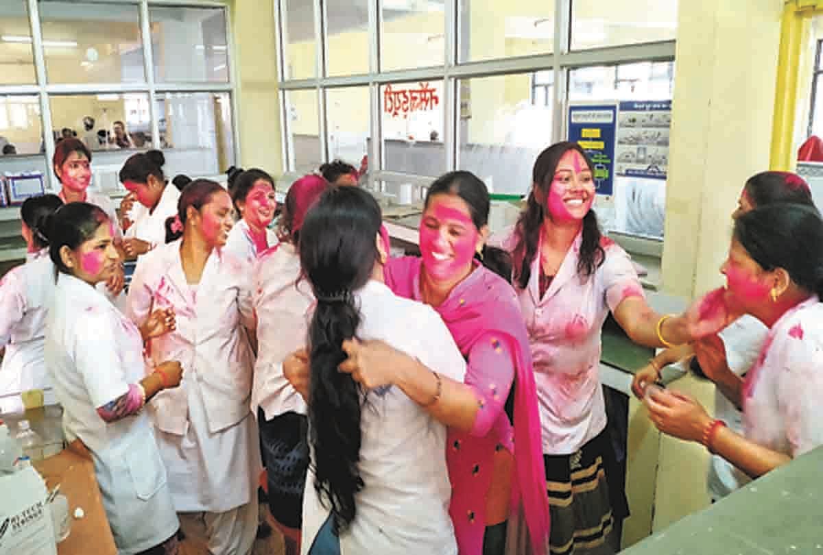 People immersed with Holika Dhahan