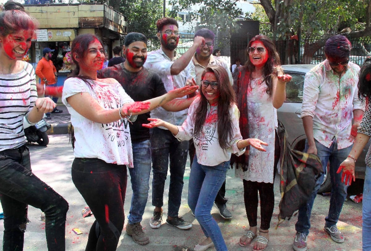 People celebrate holi festival in noida