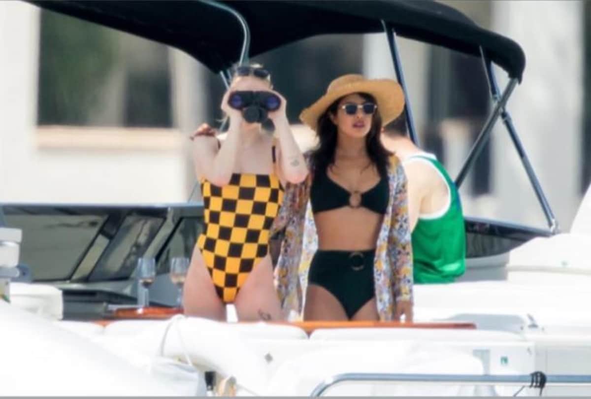 Sophie Turner chills in a plunging monokini with Priyanka Chopra and Nick Jonas