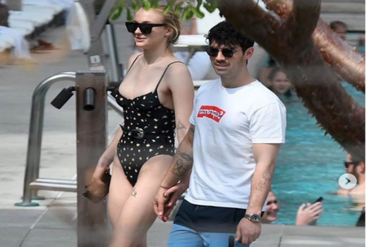 Sophie Turner chills in a plunging monokini with Priyanka Chopra and Nick Jonas