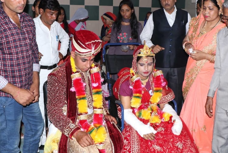 groom marriage with the bride sitting on the wheel chair in Hisar