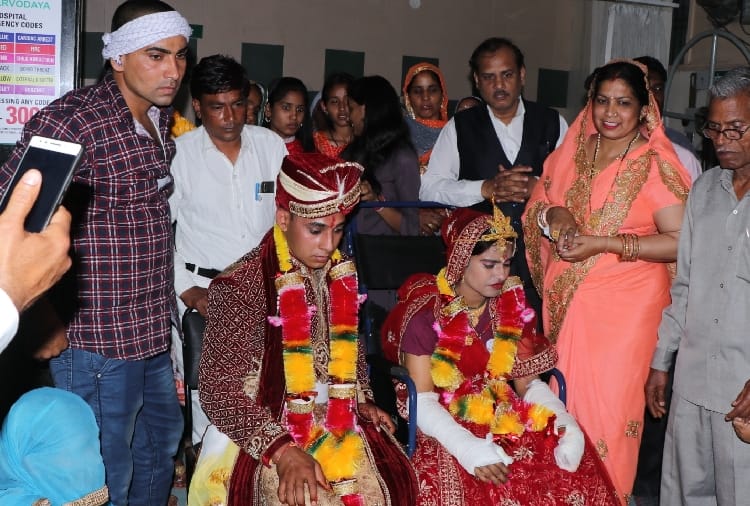 groom marriage with the bride sitting on the wheel chair in Hisar