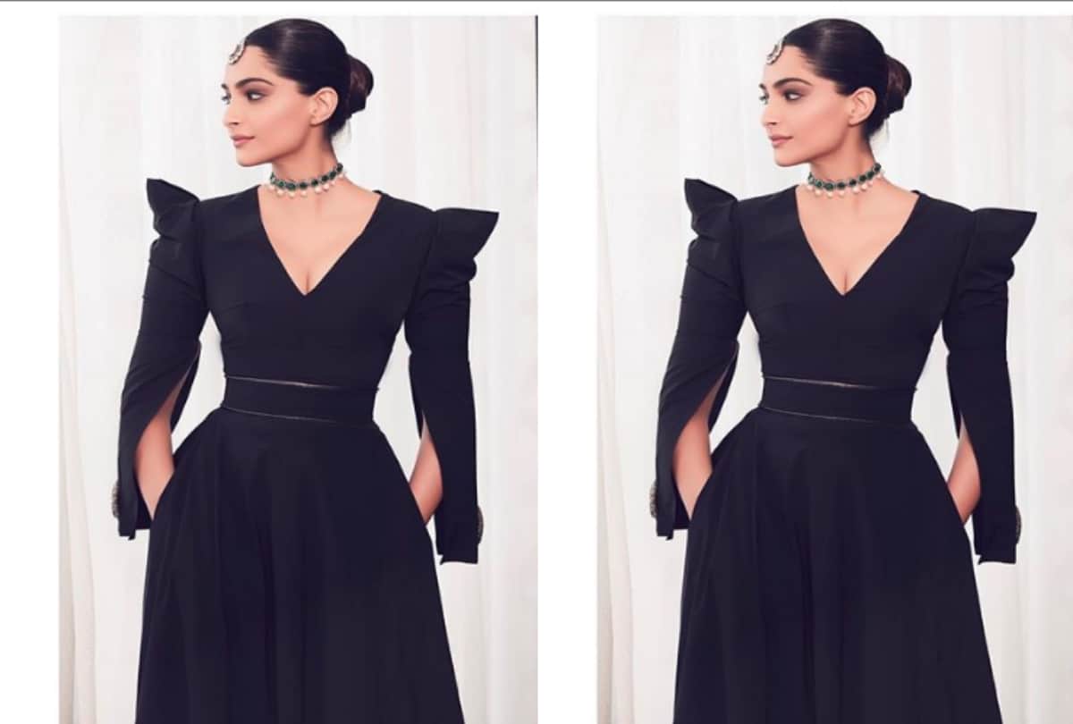 Sonam Kapoor looks gorgeous in Black outfit emerald choker necklace and maang tika