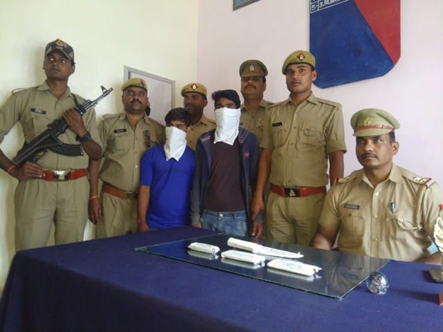 Two people arrested with stolen mobile and knife