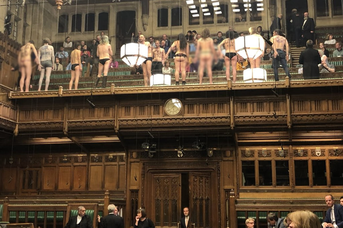 Semi Naked protest in British Parliament, environmental activist unhappy with Brexit Deal