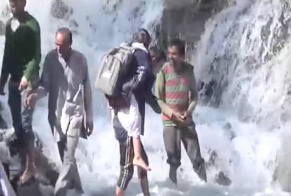 People crossing the drain by putting their life in danger in chamba himachal